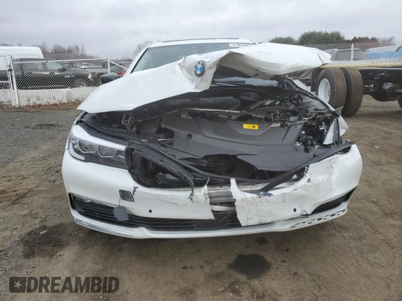 2018 BMW 7 Series 740e xDrive with VIN WBA7J2C57JG938114, listed as a Copart auction lot 41833424 with 45,559 mi miles and . Bid and sale history available at DreamBid. Image 5.