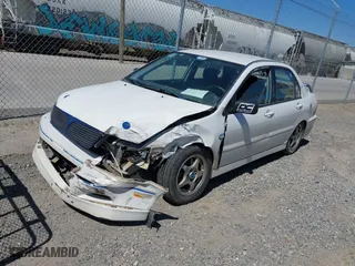 2002 Mitsubishi Lancer OZ-Rally with VIN JA3AJ86E42U039140, listed as a IAAI auction lot 41853888 with 328,181 mi miles. Bid and sale history available at carsss.com. Image 17.