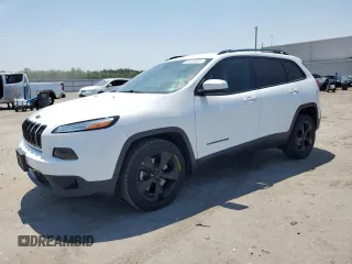 2016 Jeep Cherokee Altitude with VIN 1C4PJLCB8GW207480, listed as a Copart auction lot 62026585 with 124,229 mi miles and Salvage title. Bid and sale history available at DreamBid. Image 1.