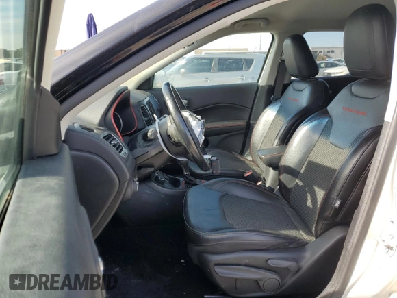 2020 Jeep Compass Trailhawk with VIN 3C4NJDDB3LT189398, listed as a Copart auction lot 88671285 with 75,672 mi miles and Salvage title. Bid and sale history available at DreamBid. Image 7.