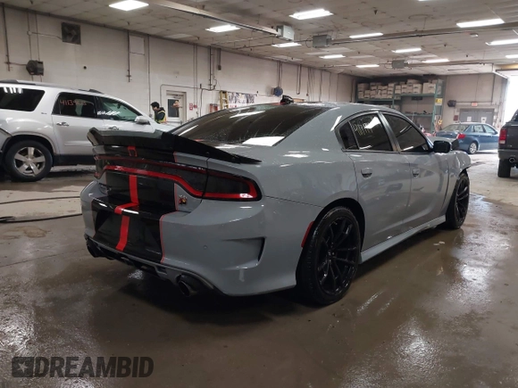 2021 Dodge Charger Scat Pack Widebody with VIN 2C3CDXGJ4MH540627, listed as a IAAI auction lot 41171991 with 31,394 mi miles and . Bid and sale history available at DreamBid. Image 4.