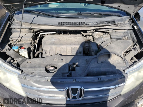 2012 Honda Odyssey EX-L with VIN 5FNRL5H69CB141594, listed as a Copart auction lot 55422115 with 181,745 mi miles and Salvage Title. Bid and sale history available at DreamBid. Image 12.