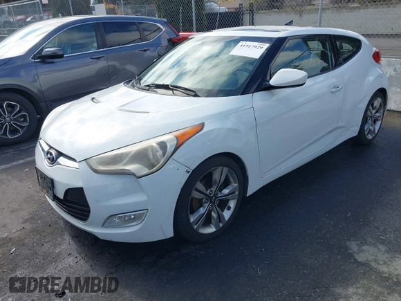 2012 Hyundai Veloster w/Gray Int с VIN KMHTC6ADXCU027658, выставлен на аукционе IAAI как лот 41517929 с пробегом 142 884 миль миль и . История ставок и продаж доступна на DreamBid. Изображение 2.