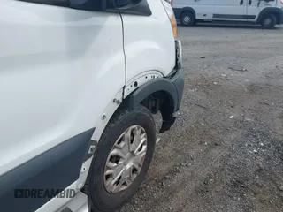 2015 Ford Transit Cargo z VIN 1FTNR1ZM5FKA65799, wystawiony jako IAAI lot #42473586 z przebiegiem 99 756 mil mil oraz . Historia ofert i sprzedaży dostępna na DreamBid. Obrazek 6.