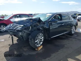 2013 Cadillac XTS Luxury with VIN 2G61P5S31D9182553, listed as a IAAI auction lot 42076227 with 116,849 mi miles and . Bid and sale history available at DreamBid. Image 6.