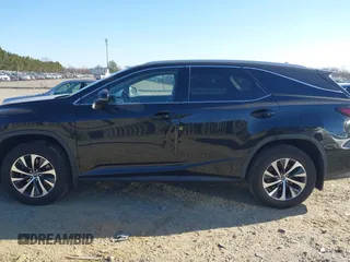 2022 Lexus RX with VIN JTJHZKFA7N2037057, listed as a IAAI auction lot 41804899 with 157,549 mi miles. Bid and sale history available at carsss.com. Image 15.