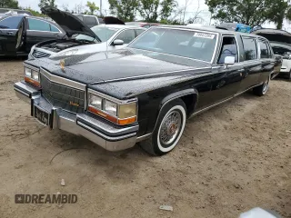 1986 Cadillac Fleetwood z VIN 1G6DW69YXG9739705, wystawiony jako Copart lot #74947294 z przebiegiem 53 213 mil mil oraz Nie do naprawy. Historia ofert i sprzedaży dostępna na DreamBid. Obrazek 1.