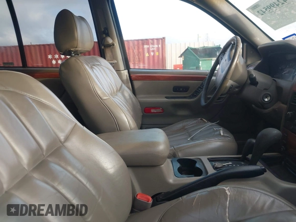1999 Jeep Grand Cherokee Limited with VIN 1J4GW68N4XC740234, listed as a IAAI auction lot 42499542 with 204,036 mi miles and . Bid and sale history available at DreamBid. Image 5.