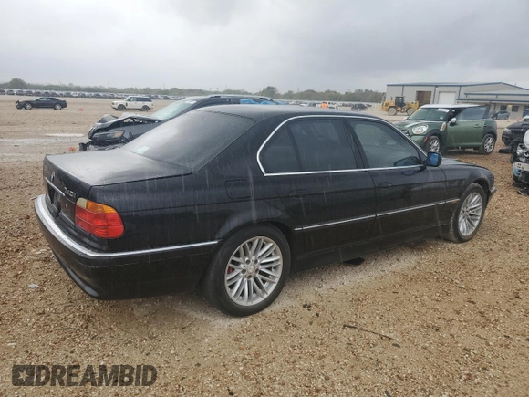 2000 BMW 7 Series 740i with VIN WBAGG8342YDN79307, listed as a Copart auction lot 80962694 with 166,520 mi miles and Clean title. Bid and sale history available at DreamBid. Image 3.