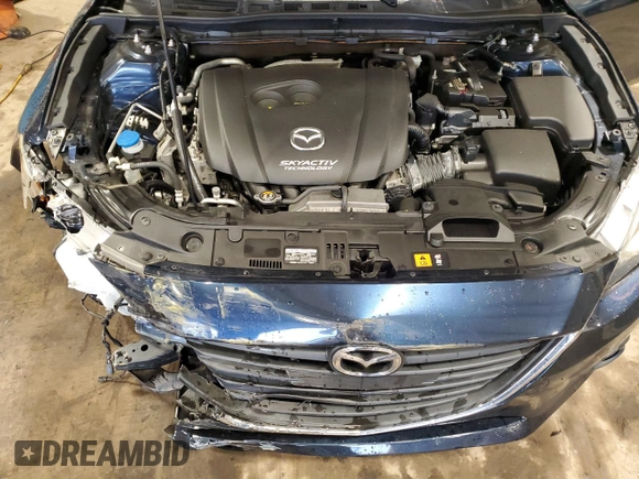 2016 Mazda 3 i Touring z VIN JM1BM1V73G1348484, wystawiony jako Copart lot #60684625 z przebiegiem 58 770 mil mil oraz Szkoda całkowita • Salvage title. Historia ofert i sprzedaży dostępna na DreamBid. Obrazek 11.
