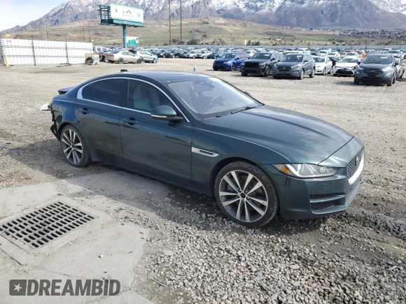 2017 Jaguar XE 35t Prestige with VIN SAJAK4BV2HA974312, listed as a Copart auction lot 51285455 with 99,910 mi miles and Salvage Title. Bid and sale history available at DreamBid. Image 4.