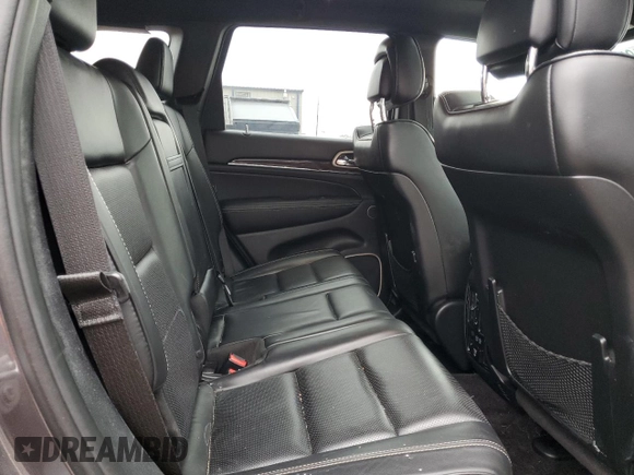 2017 Jeep Grand Cherokee Overland with VIN 1C4RJFCG8HC607872, listed as a Copart auction lot 57493195 with 164,478 mi miles and Salvage title. Bid and sale history available at DreamBid. Image 11.