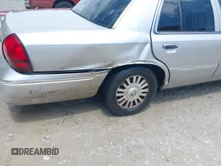 2004 Mercury Grand Marquis LS Premium z VIN 2MEFM75W74X664774, wystawiony jako IAAI lot #42111972 z przebiegiem 273 203 mil mil oraz . Historia ofert i sprzedaży dostępna na DreamBid. Obrazek 6.
