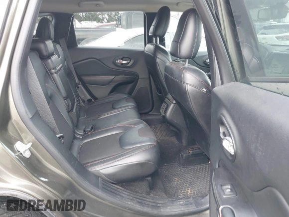 2015 Jeep Cherokee Trailhawk with VIN 1C4PJMBB5FW510514, listed as a IAAI auction lot 41492111 with 98,482 mi miles and . Bid and sale history available at DreamBid. Image 8.
