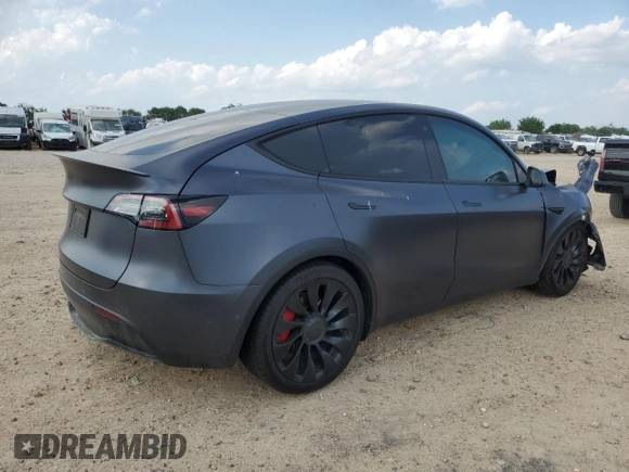 2022 Tesla Model Y Performance with VIN 7SAYGDEF2NF460730, listed as a Copart auction lot 54127945 with 59,735 mi miles and Salvage title. Bid and sale history available at DreamBid. Image 3.