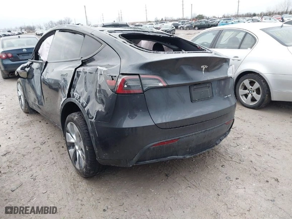 2024 Tesla Model Y Long Range with VIN 7SAYGDEE9RA288125, listed as a IAAI auction lot 41185266 with NaN miles. Bid and sale history available at carsss.com. Image 3.