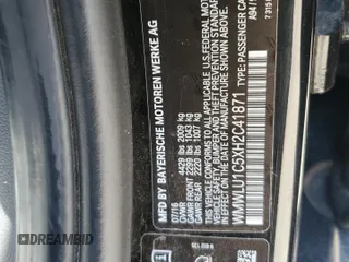 2017 MINI Clubman Cooper with VIN WMWLU1C5XH2C41871, listed as a Copart auction lot 61709154 with 87,570 mi miles and Salvage Title. Bid and sale history available at carsss.com. Image 14.