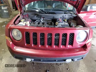 2016 Jeep Patriot High Altitude with VIN 1C4NJRFBXGD597578, listed as a Copart auction lot 58857115 with 128,911 mi miles and Salvage title. Bid and sale history available at DreamBid. Image 12.