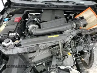 2024 Nissan Frontier SV z VIN 1N6ED1FK8RN660891, wystawiony jako Copart lot #42144235 z przebiegiem 2 569 mil mil oraz Szkoda całkowita • Salvage title. Historia ofert i sprzedaży dostępna na DreamBid. Obrazek 15.