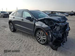 2022 Cadillac XT4 FWD Sport z VIN 1GYFZER45NF156035, wystawiony jako Copart lot #65836294 z przebiegiem 62 443 mil mil oraz Szkoda całkowita • Salvage title. Historia ofert i sprzedaży dostępna na DreamBid. Obrazek 4.