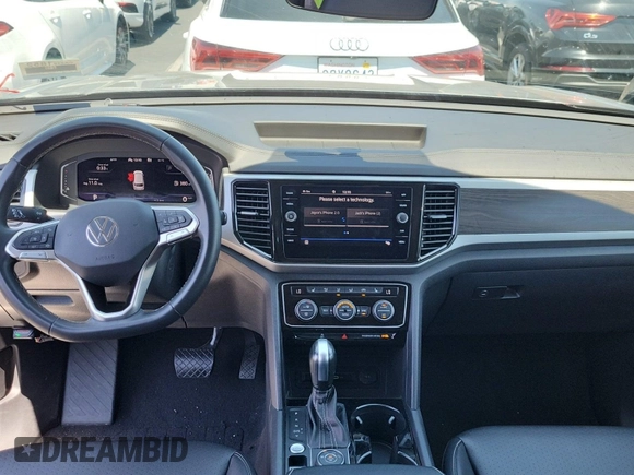 2023 Volkswagen Atlas SE z VIN 1V2HR2CA5PC526012, wystawiony jako IAAI lot #42796408 z przebiegiem 41 216 mil mil oraz . Historia ofert i sprzedaży dostępna na DreamBid. Obrazek 53.