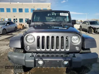 2017 Jeep Wrangler Unlimited Sahara with VIN 1C4HJWEG4HL615069, listed as a Copart auction lot 46480225 with 104,723 mi miles and Salvage title. Bid and sale history available at DreamBid. Image 5.