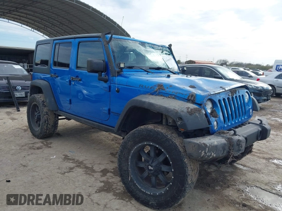 2015 Jeep Wrangler Unlimited Rubicon with VIN 1C4BJWFG5FL558348, listed as a IAAI auction lot 41460025 with 106,012 mi miles. Bid and sale history available at carsss.com. Image 1.