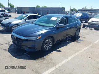 2022 Honda Insight Touring with VIN 19XZE4F90NE001251, listed as a IAAI auction lot 42303914 with 161,489 mi miles and . Bid and sale history available at DreamBid. Image 2.