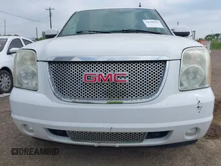 2007 GMC Yukon Denali z VIN 1GKFK63807J246645, wystawiony jako IAAI lot #42290133 z przebiegiem 187 480 mil mil oraz . Historia ofert i sprzedaży dostępna na DreamBid. Obrazek 6.