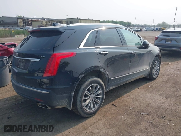 2018 Cadillac XT5 Luxury AWD with VIN 1GYKNDRSXJZ247863, listed as a IAAI auction lot 42392404 with 96,629 mi miles and . Bid and sale history available at DreamBid. Image 4.