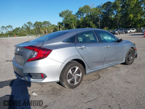 2020 Honda Civic LX with VIN 19XFC2F63LE004953, listed as a IAAI auction lot 41824922 with 71,458 mi miles and . Bid and sale history available at DreamBid. Image 4.