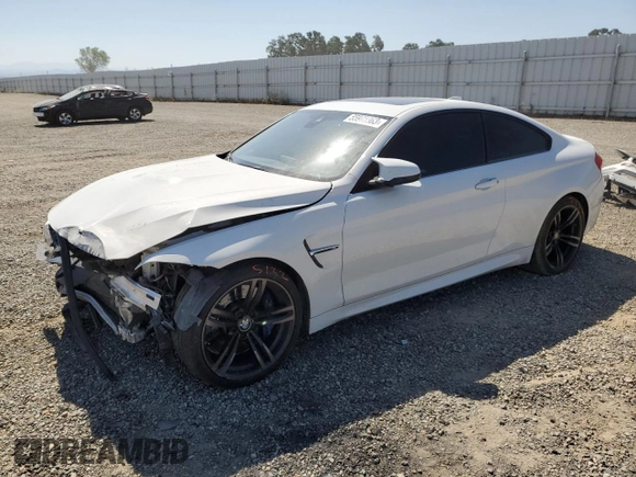 2015 BMW M4 with VIN WBS3R9C5XFK332385, listed as a Copart auction lot 55973963 with 72,879 mi miles. Bid and sale history available at carsss.com. Image 1.
