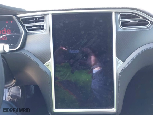 2016 Tesla Model S 70 kWh Battery with VIN 5YJSA1E17GF171143, listed as a IAAI auction lot 41707192 with NaN miles. Bid and sale history available at carsss.com. Image 14.
