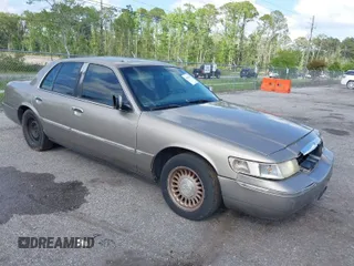 2001 Mercury Grand Marquis LS with VIN 2MEFM75W91X676839, listed as a IAAI auction lot 41966239 with 207,374 mi miles and . Bid and sale history available at DreamBid. Image 1.