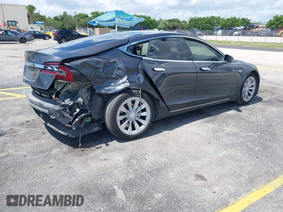 2016 Tesla Model S 70 with VIN 5YJSA1E16GF156312, listed as a IAAI auction lot 42469451 with 90,317 mi miles and . Bid and sale history available at DreamBid. Image 4.