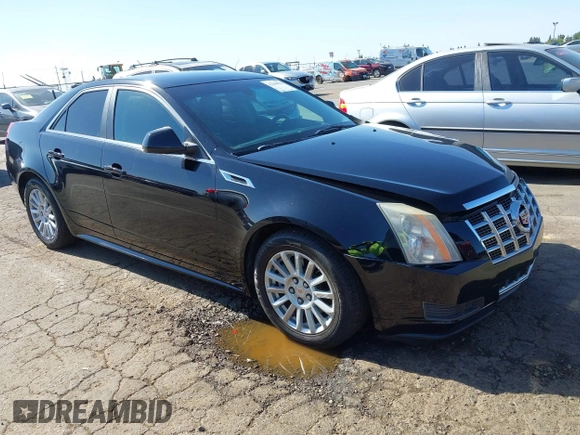 2013 Cadillac CTS Luxury with VIN 1G6DE5E51D0165634, listed as a IAAI auction lot 42208023 with 92,827 mi miles and . Bid and sale history available at DreamBid. Image 1.