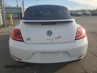 2016 Volkswagen Beetle S with VIN 3VW517AT2GM823862, listed as a Copart auction lot 48981785 with 47,114 mi miles and Salvage Title. Bid and sale history available at DreamBid. Image 6.