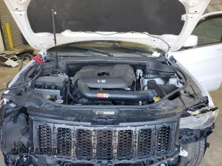 2015 Jeep Grand Cherokee Summit with VIN 1C4RJFJG1FC226591, listed as a Copart auction lot 52926115 with 130,803 mi miles and Salvage Title. Bid and sale history available at DreamBid. Image 12.