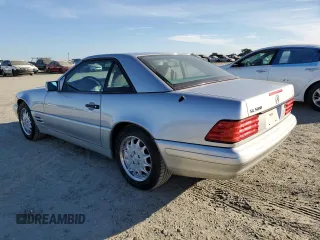 1996 Mercedes-Benz SL-Class with VIN WDBFA67F7TF129745, listed as a Copart auction lot 77851354 with 83,118 mi miles and Clean Title. Bid and sale history available at carsss.com. Image 2.