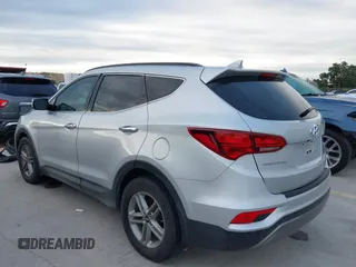 2017 Hyundai Santa Fe 2.4L with VIN 5XYZU3LB4HG464876, listed as a IAAI auction lot 42693100 with 127,888 mi miles and . Bid and sale history available at DreamBid. Image 3.