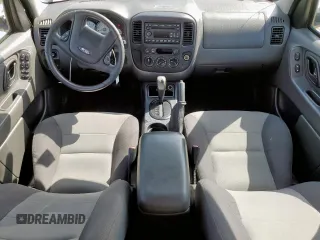 2007 Ford Escape XLS with VIN 1FMYU02Z87KB60530, listed as a Copart auction lot 61273345 with 57,574 mi miles and Salvage title. Bid and sale history available at DreamBid. Image 8.