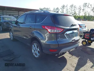 2016 Ford Escape Titanium with VIN 1FMCU9J94GUA63359, listed as a IAAI auction lot 41954514 with 94,315 mi miles. Bid and sale history available at carsss.com. Image 3.
