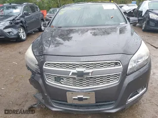 2013 Chevrolet Malibu LTZ with VIN 1G11H5SA1DF286288, listed as a IAAI auction lot 40457277 with 216,703 mi miles. Bid and sale history available at carsss.com. Image 12.