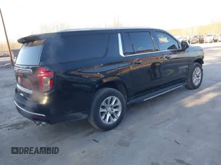 2023 Chevrolet Suburban Premier with VIN 1GNSKFKD3PR263697, listed as a IAAI auction lot 41903910 with 31,574 mi miles and . Bid and sale history available at DreamBid. Image 4.