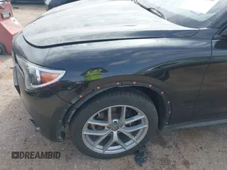 2018 Alfa Romeo Stelvio Sport z VIN ZASFAKPN0J7B71013, wystawiony jako IAAI lot #41938050 z przebiegiem Nie podano mil oraz . Historia ofert i sprzedaży dostępna na DreamBid. Obrazek 6.