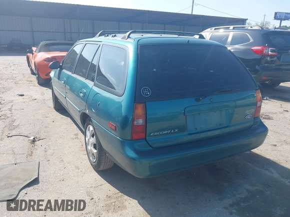 1997 Ford Escort LX z VIN 3FALP15P7VR158272, wystawiony jako IAAI lot #41833216 z przebiegiem 148 170 mil mil oraz . Historia ofert i sprzedaży dostępna na DreamBid. Obrazek 3.