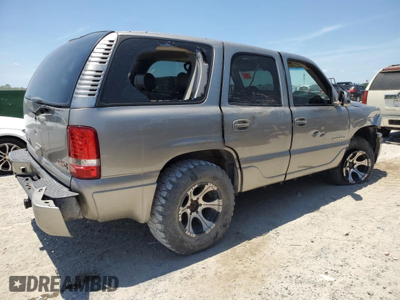 2001 GMC Yukon Denali z VIN 1GKEK63U41J314185, wystawiony jako Copart lot #58430005 z przebiegiem Nie podano mil oraz Szkoda całkowita • Salvage title. Historia ofert i sprzedaży dostępna na DreamBid. Obrazek 3.