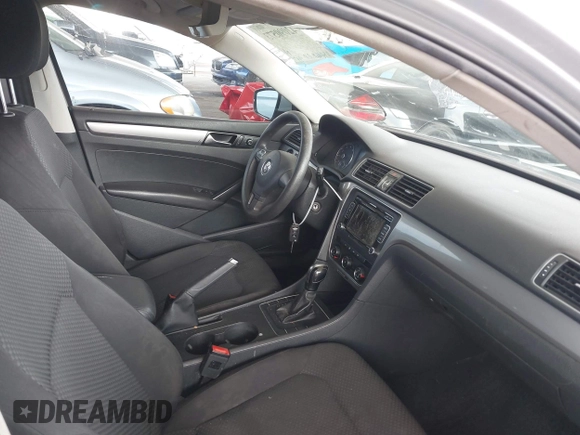 2015 Volkswagen Passat 1.8T Limited Edition with VIN 1VWAT7A34FC077021, listed as a IAAI auction lot 42090573 with 230,465 mi miles. Bid and sale history available at carsss.com. Image 5.