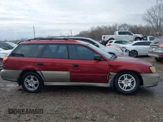 2002 Subaru Legacy Outback z VIN 4S3BH675727632462, wystawiony jako IAAI lot #41197344 z przebiegiem 200 788 mil mil oraz . Historia ofert i sprzedaży dostępna na DreamBid. Obrazek 13.