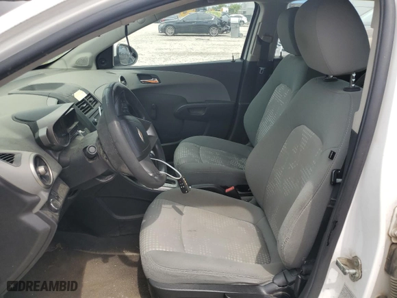 2014 Chevrolet Sonic LS with VIN 1G1JA6SH1E4134791, listed as a Copart auction lot 72186234 with 209,605 mi miles and Clean Title. Bid and sale history available at carsss.com. Image 7.